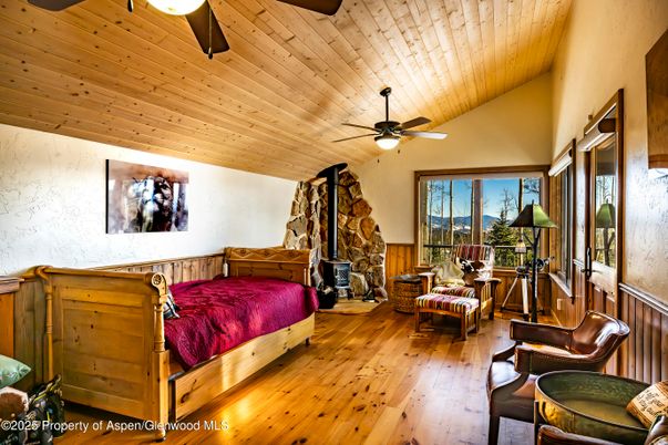 Bedroom, Fireplace, Interior, Stone Walls, Wooden Ceilings, Wood Texture Flooring