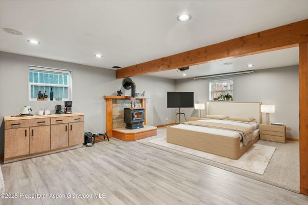 Bedroom, Fireplace, Interior, Recessed Lighting, Wooden Beams, Wood Texture Flooring
