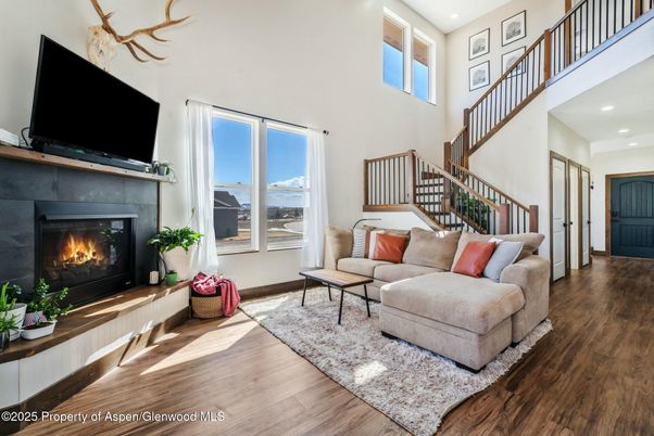 Fireplace, Interior, Living room, Recessed Lighting, Wood Texture Flooring