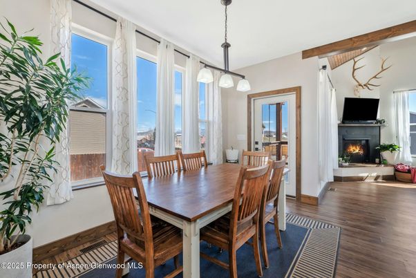Dining room, Fireplace, Interior, Pendant Lights, Wooden Beams, Wood Texture Flooring
