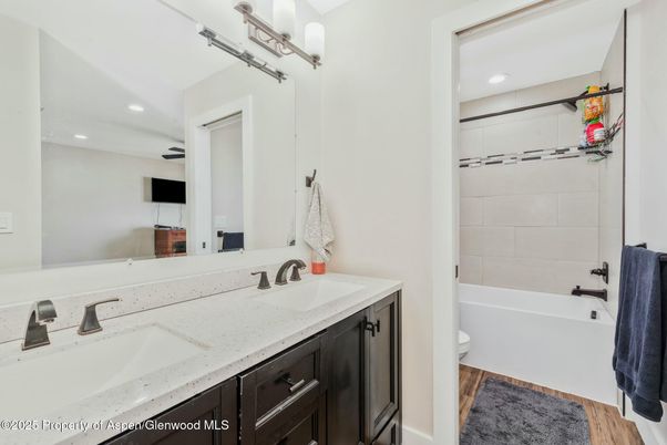 Bathroom, Dual Sink Vanities, Interior, Recessed Lighting, Wood Texture Flooring