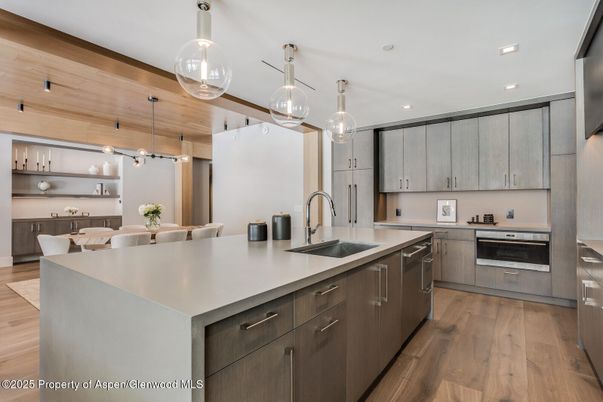 Dining room, Interior, Kitchen, Pendant Lights, Recessed Lighting, Stainless Steel Appliances, Wood Texture Flooring