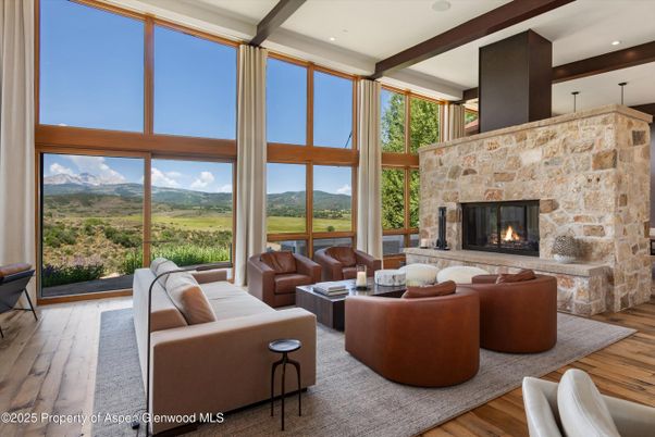 Fireplace, Interior, Living room, Recessed Lighting, Stone Walls, Wood Texture Flooring