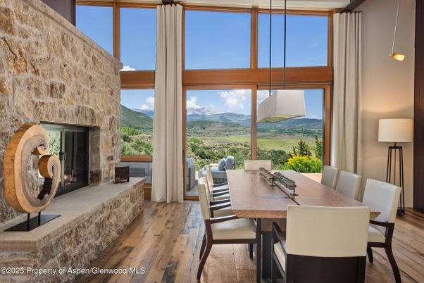 Dining room, Fireplace, Interior, Pendant Lights, Stone Walls, Wood Texture Flooring