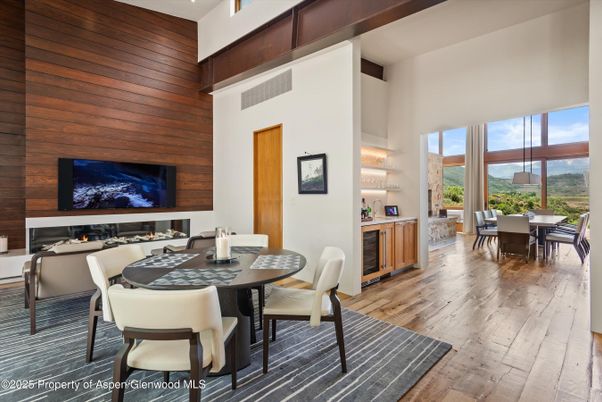Dining room, Fireplace, Interior, Pendant Lights, Wood Texture Flooring, Wooden Walls