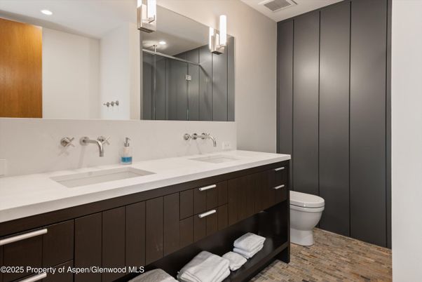 Bathroom, Dual Sink Vanities, Interior, Recessed Lighting, Wood Texture Flooring