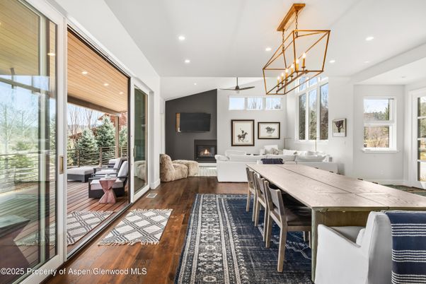 Dining room, Fireplace, Interior, Living room, Pendant Lights, Recessed Lighting, Wood Texture Flooring