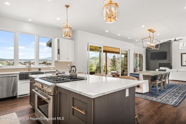 Dining room, Interior, Kitchen, Pendant Lights, Recessed Lighting, Stainless Steel Appliances, Wood Texture Flooring