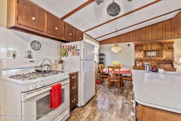 Dining room, Interior, Kitchen, Pendant Lights, Stainless Steel Appliances, Wood Texture Flooring