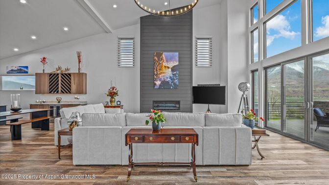 Dining room, Fireplace, Interior, Living room, Pendant Lights, Recessed Lighting, Wood Texture Flooring