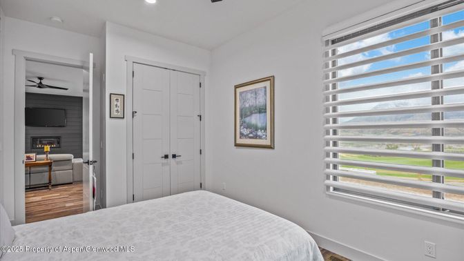 Bedroom, Fireplace, Interior, Recessed Lighting, Wood Texture Flooring