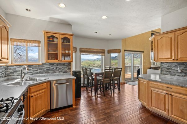 Dining room, Interior, Kitchen, Recessed Lighting, Stainless Steel Appliances, Wood Texture Flooring