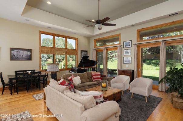 Dining room, Interior, Living room, Piano, Recessed Lighting, Wood Texture Flooring