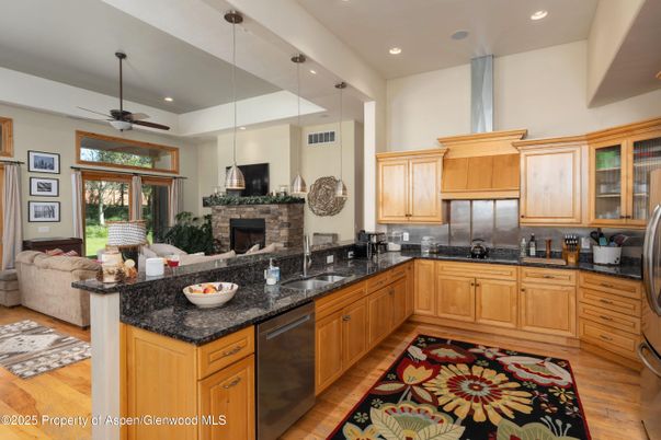 Fireplace, Interior, Kitchen, Living room, Pendant Lights, Recessed Lighting, Wood Texture Flooring