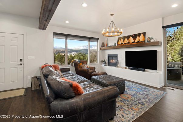 Fireplace, Interior, Living room, Recessed Lighting, Wooden Beams, Wood Texture Flooring