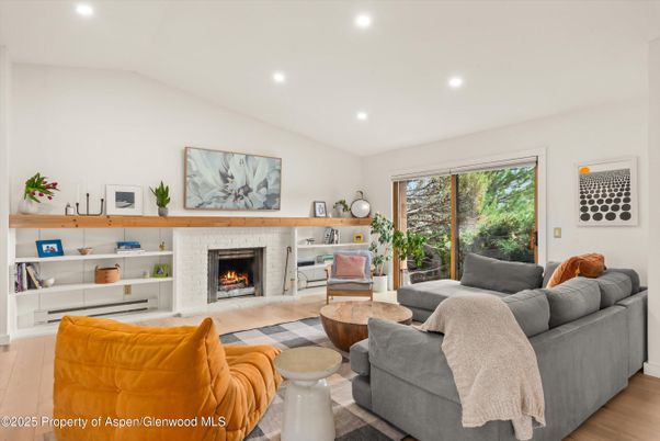 Fireplace, Interior, Living room, Recessed Lighting, Wood Texture Flooring