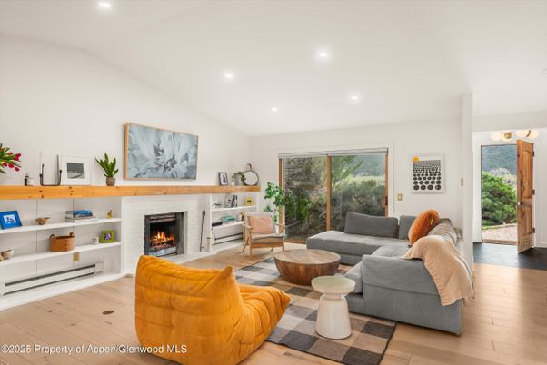 Fireplace, Interior, Living room, Recessed Lighting, Wood Texture Flooring