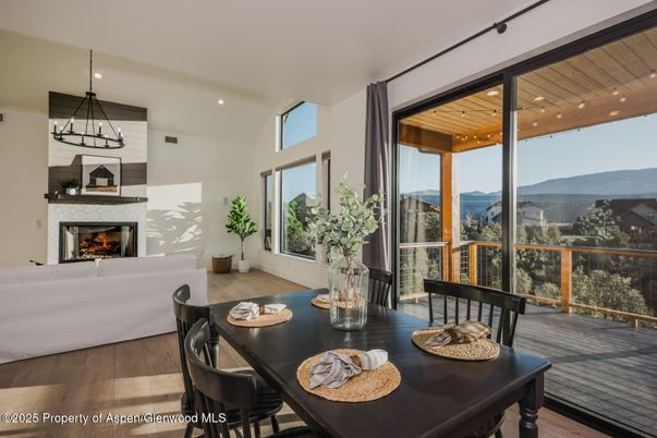 Dining room, Fireplace, Interior, Living room, Pendant Lights, Recessed Lighting, Wood Texture Flooring