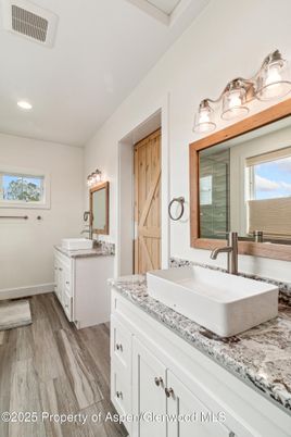 Bathroom, Dual Sink Vanities, Interior, Recessed Lighting, Wood Texture Flooring