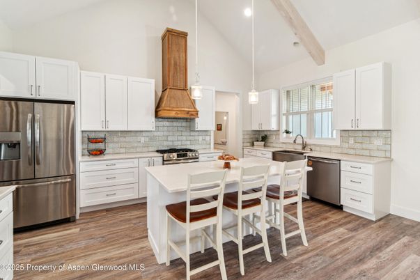 Dining room, Interior, Kitchen, Pendant Lights, Recessed Lighting, Stainless Steel Appliances, Wooden Beams, Wood Texture Flooring