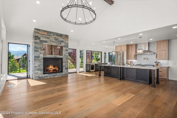 Fireplace, Interior, Kitchen, Pendant Lights, Recessed Lighting, Stainless Steel Appliances, Wood Texture Flooring