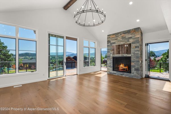 Empty room, Fireplace, Interior, Pendant Lights, Recessed Lighting, Wooden Beams, Wood Texture Flooring