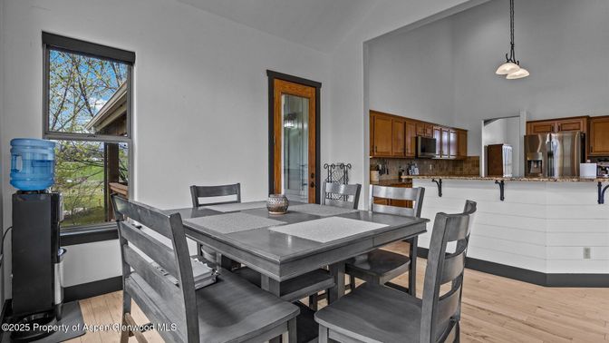 Dining room, Interior, Kitchen, Pendant Lights, Stainless Steel Appliances, Wood Texture Flooring