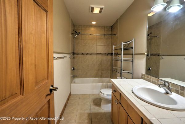 Bathroom, Glass Shower, Interior, Recessed Lighting, Tile Countertops