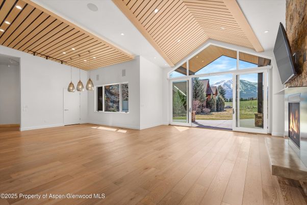 Empty room, Fireplace, Interior, Pendant Lights, Recessed Lighting, Wood Texture Flooring