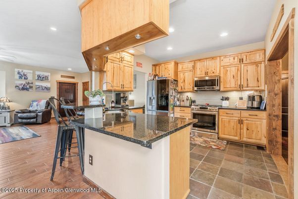 Dining room, Interior, Kitchen, Recessed Lighting, Stainless Steel Appliances, Wood Texture Flooring