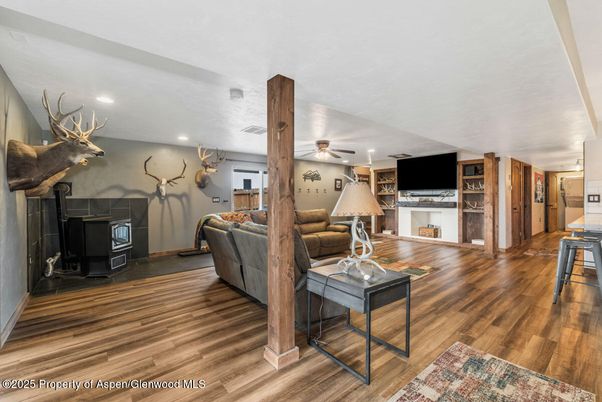 Fireplace, Interior, Living room, Recessed Lighting, Wood Texture Flooring