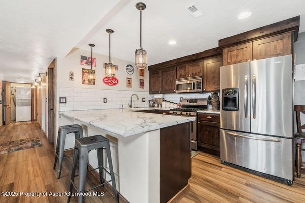Interior, Kitchen, Pendant Lights, Recessed Lighting, Stainless Steel Appliances, Wood Texture Flooring
