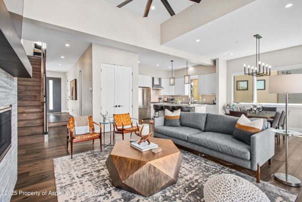 Dining room, Fireplace, Interior, Kitchen, Living room, Pendant Lights, Recessed Lighting, Stainless Steel Appliances, Wood Texture Flooring