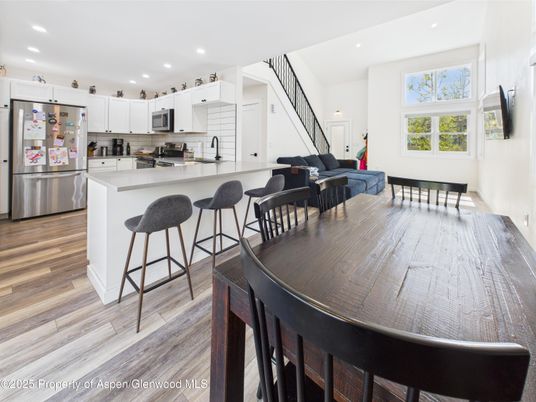 Dining room, Interior, Kitchen, Recessed Lighting, Stainless Steel Appliances, Wood Texture Flooring