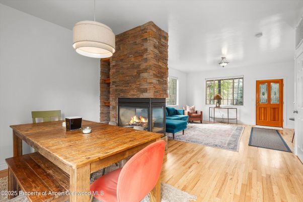 Fireplace, Interior, Living room, Pendant Lights, Stone Walls, Wood Texture Flooring