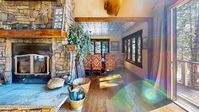 Dining room, Fireplace, Interior, Stone Walls, Wood Texture Flooring