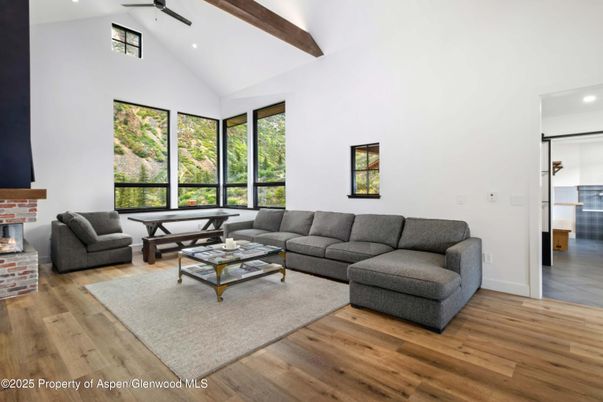 Fireplace, Interior, Living room, Recessed Lighting, Wooden Beams, Wood Texture Flooring
