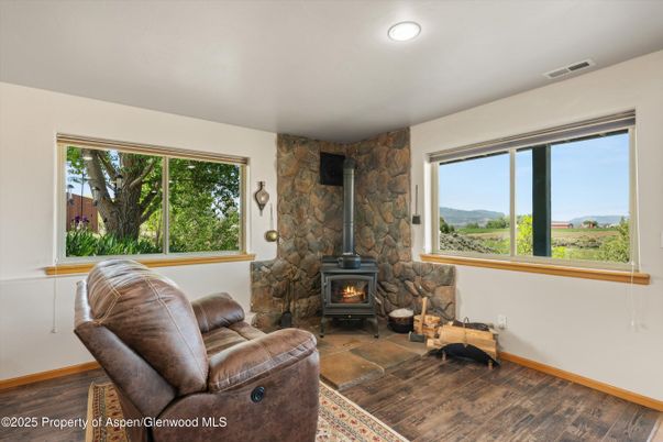 Fireplace, Interior, Recessed Lighting, Stone Walls, Wood Texture Flooring
