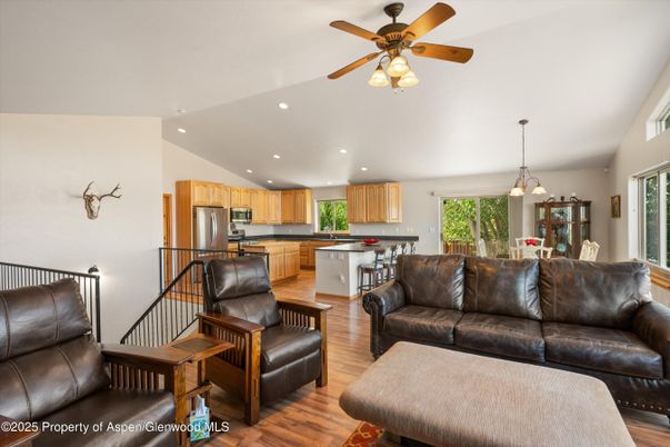 Dining room, Interior, Kitchen, Living room, Pendant Lights, Recessed Lighting, Stainless Steel Appliances, Wood Texture Flooring