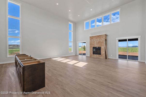 Empty room, Fireplace, Interior, Recessed Lighting, Wood Texture Flooring
