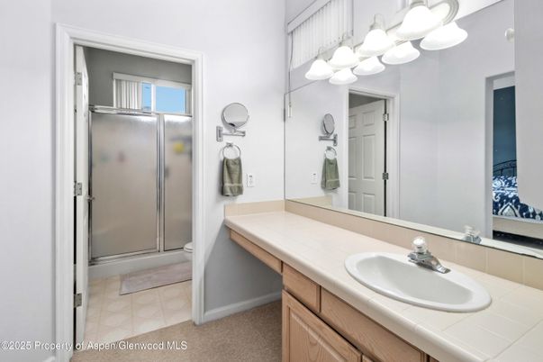 Bathroom, Dual Sink Vanities, Glass Shower, Interior, Tile Countertops