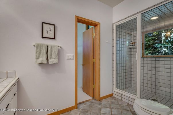 Bathroom, Glass Shower, Interior, Recessed Lighting, Tile Countertops