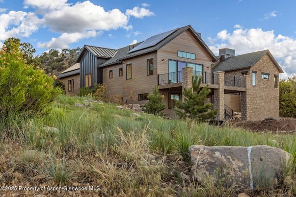Exterior, Facade, Solar Panels, Tudor Revival