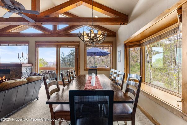 Chandelier, Dining room, Fireplace, Interior, Living room, Recessed Lighting, Wooden Beams