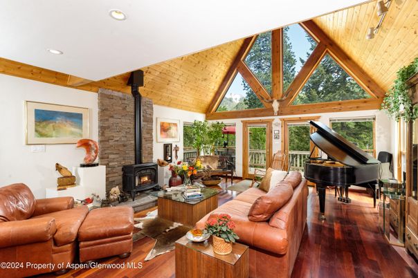 Fireplace, Interior, Living room, Piano, Recessed Lighting, Stone Walls, Wooden Ceilings, Wood Texture Flooring, Wooden Walls