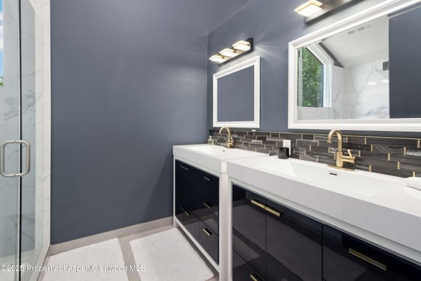 Bathroom, Dual Sink Vanities, Glass Shower, Interior, Marble Walls