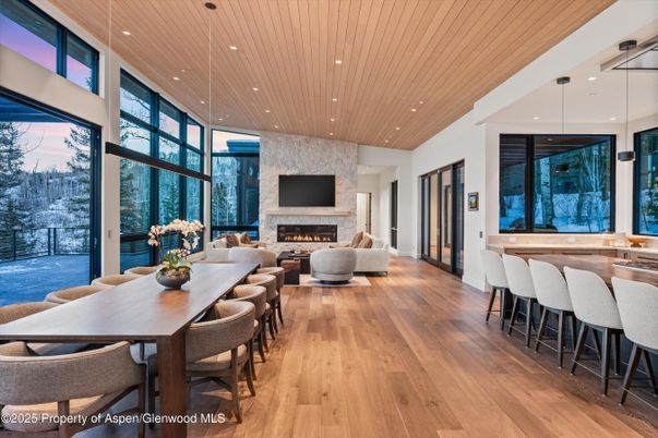 Dining room, Fireplace, Interior, Living room, Pendant Lights, Recessed Lighting, Wooden Ceilings, Wood Texture Flooring