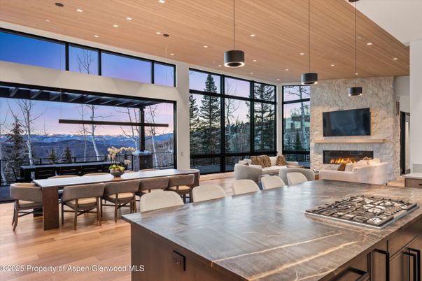 Dining room, Fireplace, Interior, Kitchen, Living room, Pendant Lights, Recessed Lighting, Wooden Ceilings, Wood Texture Flooring