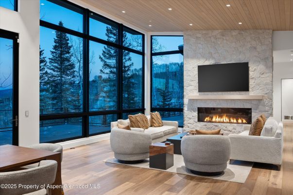 Fireplace, Interior, Living room, Recessed Lighting, Stone Walls, Wooden Ceilings, Wood Texture Flooring