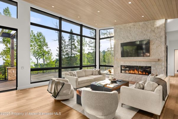 Fireplace, Interior, Living room, Recessed Lighting, Stone Walls, Wooden Ceilings, Wood Texture Flooring